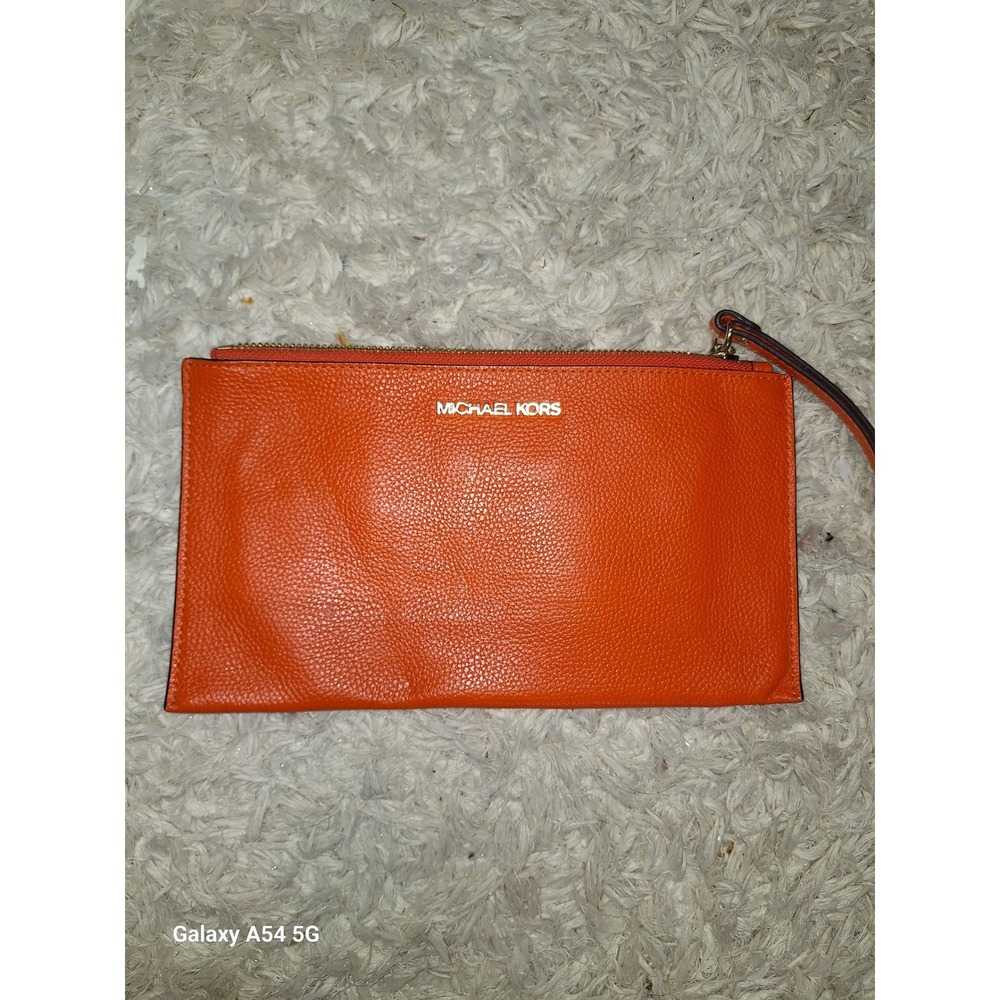 A11. Michael Kors Orange Pebbled Leather Wristlet Zip Clutch Bag